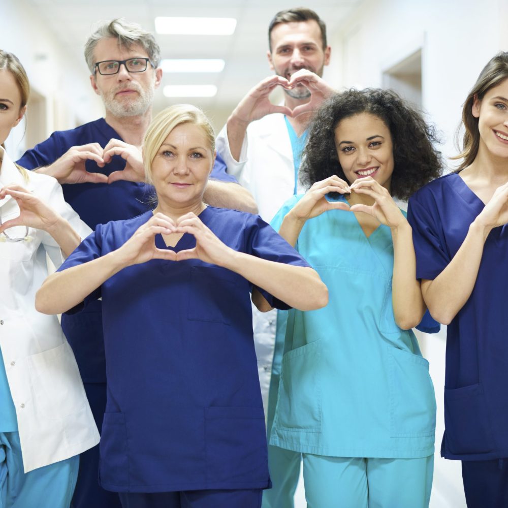 Group of doctors with heart symbol